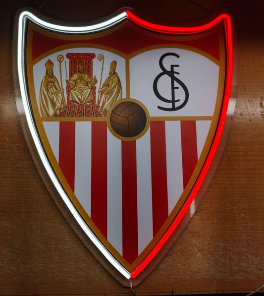 Escudo de futbol liga 1º division del Club SEVILLA, Diseño con medidas metacrilato 40x35cm aproximadamente dependiendo el diseño del escudo con neon led,metacrilato y vinilo color.Alimentacion 12v,cable 2m y cadena para colgar en pared incluido.