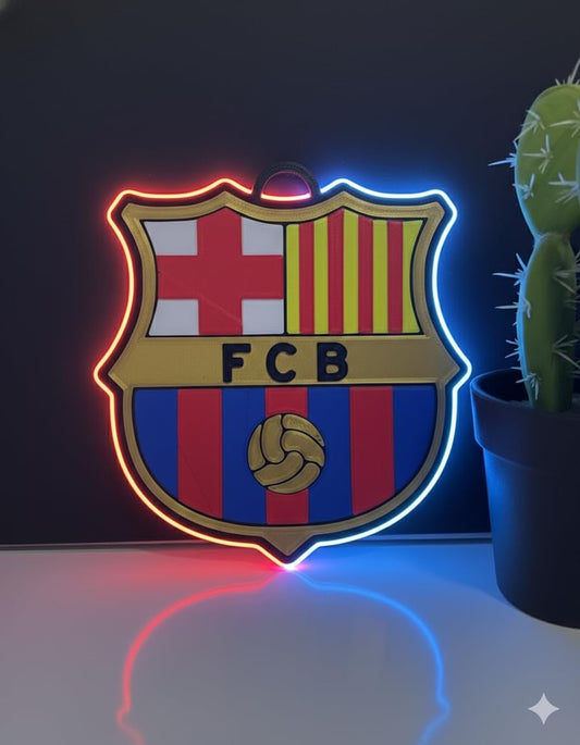Escudo de futbol liga 1º division del Club BARCELONA, Diseño con medidas metacrilato 40x35cm aproximadamente dependiendo el diseño del escudo con neon led,metacrilato y vinilo color.Alimentacion 12v,cable 2m y cadena para colgar en pared incluido.