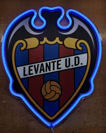 Escudo de futbol liga 1º division del Club LEVANTE, Diseño con medidas metacrilato 40x35cm aproximadamente dependiendo el diseño del escudo con neon led,metacrilato y vinilo color.Alimentacion 12v,cable 2m y cadena para colgar en pared incluido.